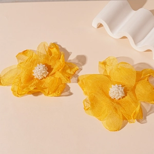 Handmade woven lace flower earrings with pearls for a sweet vacation style