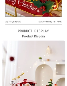 Detail of red Merry Christmas sleigh decor with miniature gold star xmas tree
