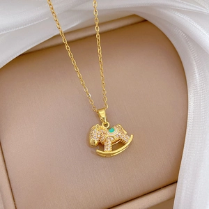 Elegant gold titanium steel necklace with luxury horse pendant featuring pavé zircons