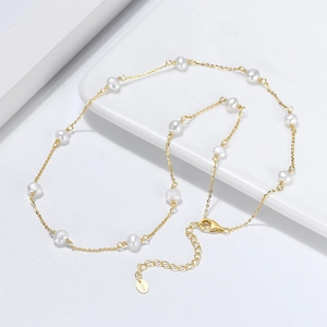 925 silver gold-plated pearl necklace featuring evenly spaced white pearls on a thin chain