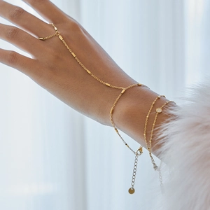 Elegantes goldenes Fingerarmband mit Bambusgliedern und Zirkon-Akzenten für Damen