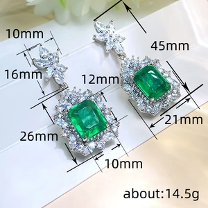 Luxurious emerald cut green drop earrings with white zircon accents for gala events