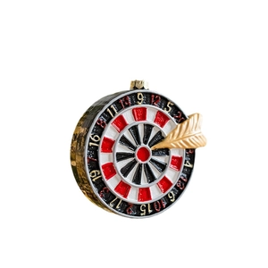 Retro dartboard Christmas tree ornament with golden darts on a clean white background