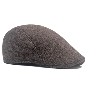 Classic men's winter ivy cap in dark coffee herringbone wool with warm padded lining