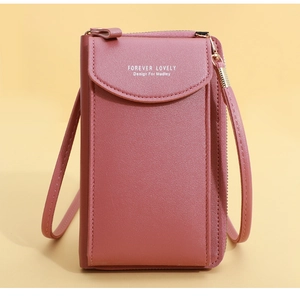Detail of pink PU leather crossbody phone bag with front pocket and metal strap hooks