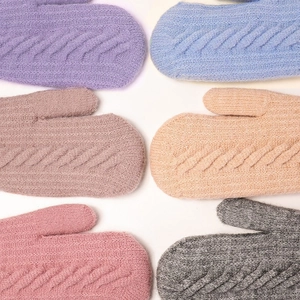 Warm winter cable knit mittens for women in multiple soft pastel colors with plush texture