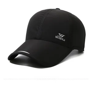 Detail of breathable quick-dry baseball cap featuring reflective brim and side logo