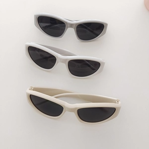 Kids Y2K retro cat eye sports sunglasses in grey, white, and beige plastic frames