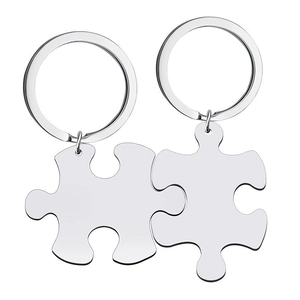 Polished stainless steel puzzle piece keychains for couples with glossy silver finish