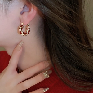 Maillard style U-shaped gold earrings with red enamel inlay and vintage geometric design
