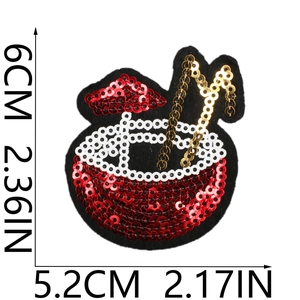 Detail view of sequined beverage patch with dimensions 6x5.2cm on white background