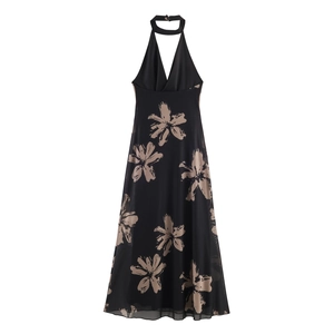 Elegant black halter neck maxi dress with beige floral mesh print in a slim fit silhouette