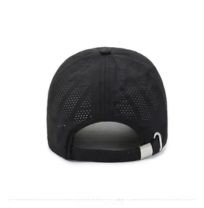 Detail of laser-cut mesh holes and metal buckle on black quick-dry baseball cap
