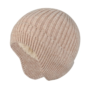 Detail of winter knit hat featuring thick warm fleece lining and beige textured wool