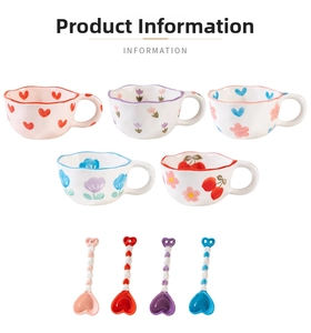 Detail of five ceramic cups with hand-painted patterns and heart-topped spoons