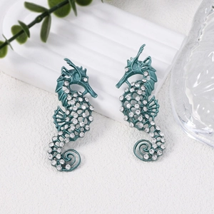 Exquisite hollow seahorse drop earrings with blue rhinestones and retro faux pearls