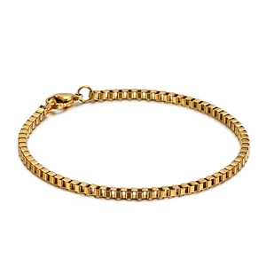 Minimalist golden titanium steel box chain bracelet with lobster clasp on white background