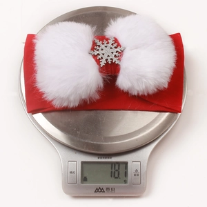 Christmas baby headband with red elastic band, white faux fur pom poms and silver snowflakes