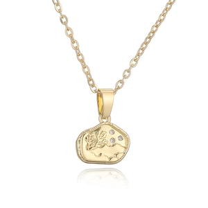 Irregular oval geometric pendant necklace in gold with branch texture and inset crystals