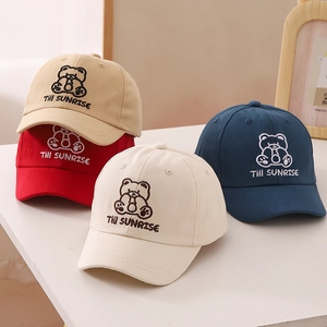 Set of four kids cartoon bear baseball caps in khaki, red, cream, and navy blue cotton