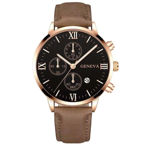 Detail of the rose gold business watch featuring a black dial and brown leather strap