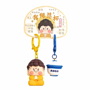 Creative Buddha keychain set with blue cup charm and cartoon quote display board