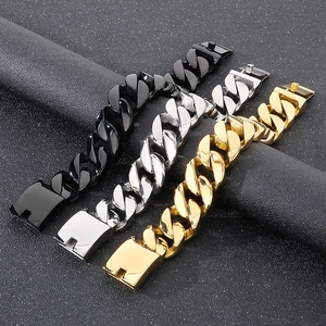 Close-up of 22mm Cuban link bracelet in gold, silver, and black polished steel