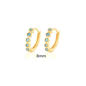 Detail of 8mm gold S925 sterling silver hoop earrings with seven blue turquoise stones