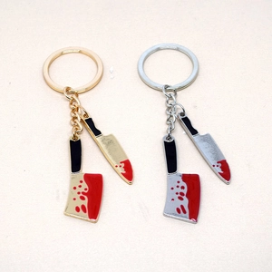 Gold and silver alloy kitchen knife keychains with realistic red blood splatters