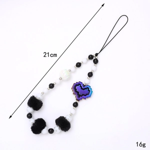 Beaded plush heart phone wrist strap with pixel pattern charm and black white beads