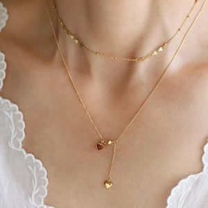 Double-layer gold plated titanium choker with tiny sequins and red heart pendant detail