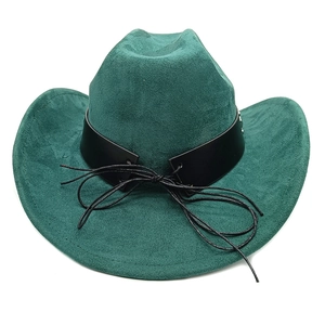 Detail of dark green suede cowboy hat with black leather band and metal rivets