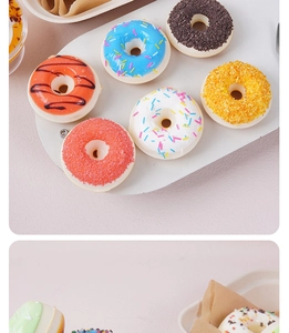 Macro shot of assorted faux donuts with realistic icing and colorful sprinkle toppings