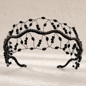 Handmade black woven crystal bridal headband with vintage beads and rhinestones on mesh frame
