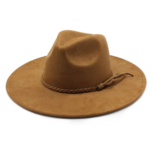 Brown faux suede fedora hat with a wide brim and decorative braided band on white background