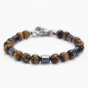 Close-up of 8mm tiger eye beads and hematite stones with durable lobster clasp