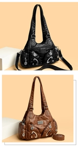 Detail of black and brown faux leather shoulder bags with floral zipper charms