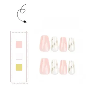 Detail of pink and white marble coffin press-on nails with gold foil and glossy finish
