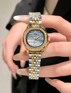 Close-up of Gedi watch featuring a diamond bezel and blue mother-of-pearl dial detail