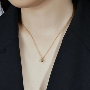 Minimalist S925 sterling silver necklace with gold ball pendant for modern women