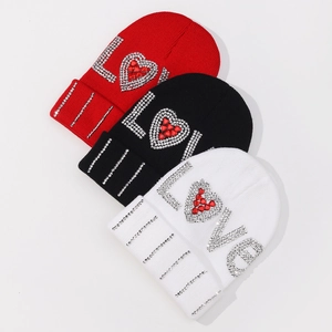 Winter knitted beanies in red black and white with LOVE rhinestone patterns