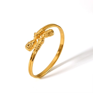 Vintage 18K gold plated stainless steel knot bangle with textured spiral engraving