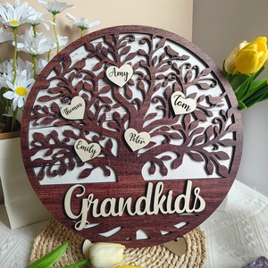 Macro detail of custom wooden family tree plaque with heart name tags and Grandkids text