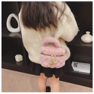 Pink plush kids bag with gold rose pendant and woven metal chain strap detail