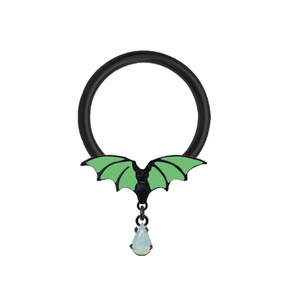 Detail of gothic black hoop ring featuring a green bat and teardrop opal pendant