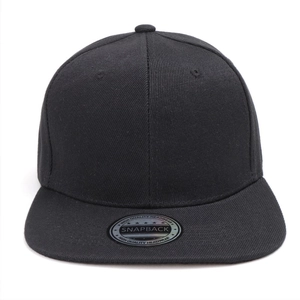 Detailed view of black snapback cap featuring a six-panel structure and silver round sticker