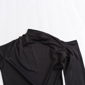 Elegant black asymmetric long sleeve dress featuring a unique irregular neckline design