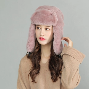 Winter faux fur trapper hat in dusty rose with ear flaps for warmth and wind protection