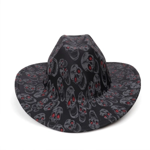 Detailed macro view of black cowboy hat with grey skull pattern and red glitter eyes