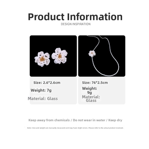 Detail view of handmade white camellia pearl earrings and necklace set dimensions